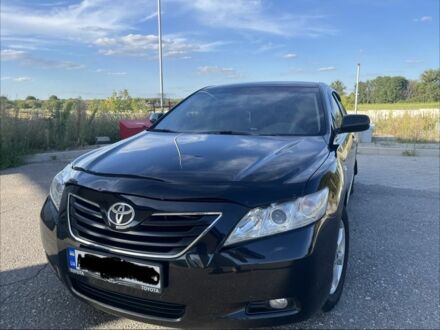 Чорний Тойота Камрі, об'ємом двигуна 2.4 л та пробігом 320 тис. км за 8700 $, фото 1 на Automoto.ua