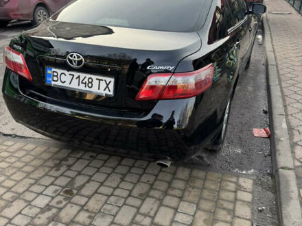 Чорний Тойота Камрі, об'ємом двигуна 2.4 л та пробігом 302 тис. км за 8400 $, фото 1 на Automoto.ua