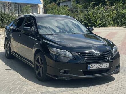 Чорний Тойота Камрі, об'ємом двигуна 2.36 л та пробігом 253 тис. км за 9600 $, фото 1 на Automoto.ua