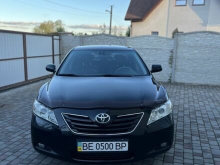 Черный Тойота Камри, объемом двигателя 2.4 л и пробегом 280 тыс. км за 8900 $, фото 1 на Automoto.ua