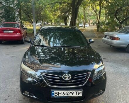 Черный Тойота Камри, объемом двигателя 2.4 л и пробегом 253 тыс. км за 8100 $, фото 1 на Automoto.ua