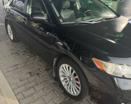 Черный Тойота Камри, объемом двигателя 2.4 л и пробегом 169 тыс. км за 8700 $, фото 1 на Automoto.ua