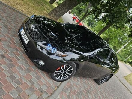 Черный Тойота Камри, объемом двигателя 2.4 л и пробегом 283 тыс. км за 7200 $, фото 1 на Automoto.ua