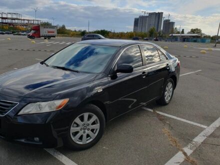Чорний Тойота Камрі, об'ємом двигуна 2.4 л та пробігом 261 тис. км за 8300 $, фото 1 на Automoto.ua