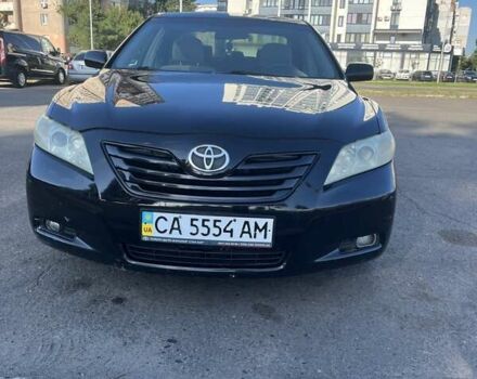 Чорний Тойота Камрі, об'ємом двигуна 2.4 л та пробігом 231 тис. км за 7300 $, фото 1 на Automoto.ua
