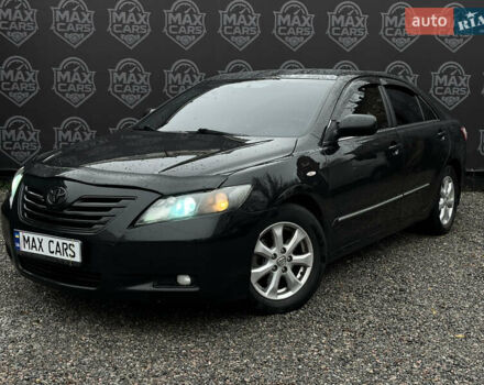 Черный Тойота Камри, объемом двигателя 2.4 л и пробегом 208 тыс. км за 7900 $, фото 1 на Automoto.ua