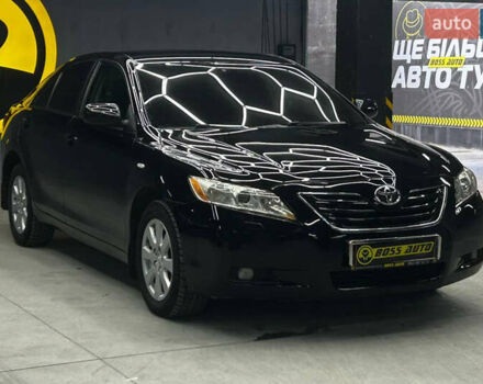 Черный Тойота Камри, объемом двигателя 2.36 л и пробегом 290 тыс. км за 8000 $, фото 1 на Automoto.ua