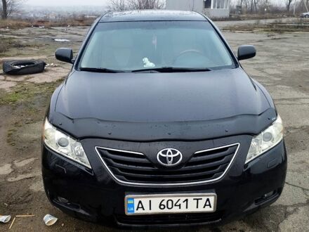 Черный Тойота Камри, объемом двигателя 2.4 л и пробегом 290 тыс. км за 9000 $, фото 1 на Automoto.ua