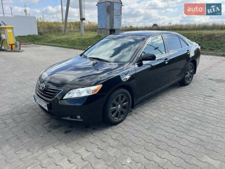 Черный Тойота Камри, объемом двигателя 2.36 л и пробегом 209 тыс. км за 8999 $, фото 1 на Automoto.ua