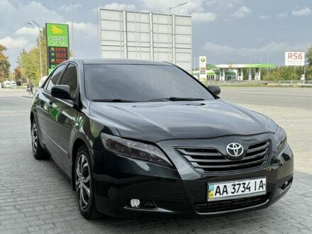 Черный Тойота Камри, объемом двигателя 2.4 л и пробегом 270 тыс. км за 6700 $, фото 1 на Automoto.ua