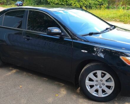 Черный Тойота Камри, объемом двигателя 2.4 л и пробегом 129 тыс. км за 10300 $, фото 1 на Automoto.ua