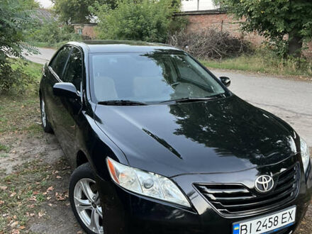 Чорний Тойота Камрі, об'ємом двигуна 2.36 л та пробігом 195 тис. км за 7850 $, фото 1 на Automoto.ua
