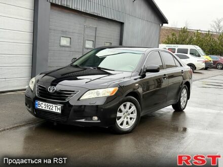 Черный Тойота Камри, объемом двигателя 2.4 л и пробегом 21000 тыс. км за 8300 $, фото 1 на Automoto.ua
