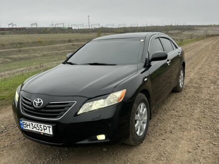 Черный Тойота Камри, объемом двигателя 2.4 л и пробегом 212 тыс. км за 8000 $, фото 1 на Automoto.ua
