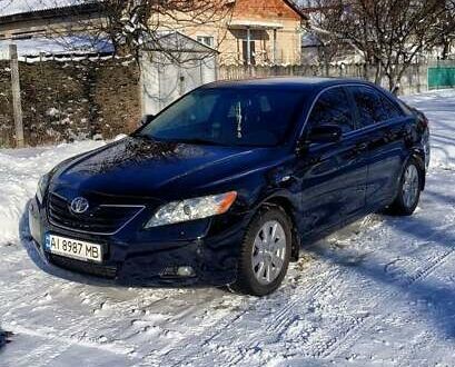 Чорний Тойота Камрі, об'ємом двигуна 2.4 л та пробігом 240 тис. км за 10300 $, фото 1 на Automoto.ua