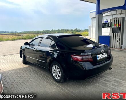 Чорний Тойота Камрі, об'ємом двигуна 2.4 л та пробігом 320 тис. км за 8000 $, фото 1 на Automoto.ua