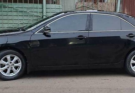 Черный Тойота Камри, объемом двигателя 2.36 л и пробегом 366 тыс. км за 10000 $, фото 1 на Automoto.ua