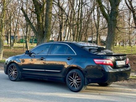 Черный Тойота Камри, объемом двигателя 2.4 л и пробегом 400 тыс. км за 7100 $, фото 1 на Automoto.ua