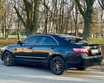 Черный Тойота Камри, объемом двигателя 2.4 л и пробегом 400 тыс. км за 7100 $, фото 1 на Automoto.ua