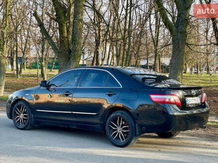 Черный Тойота Камри, объемом двигателя 2.4 л и пробегом 450 тыс. км за 7200 $, фото 1 на Automoto.ua