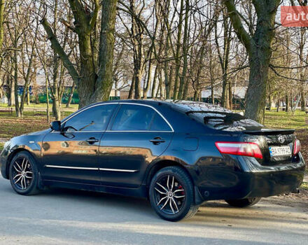 Черный Тойота Камри, объемом двигателя 2.4 л и пробегом 450 тыс. км за 7200 $, фото 1 на Automoto.ua