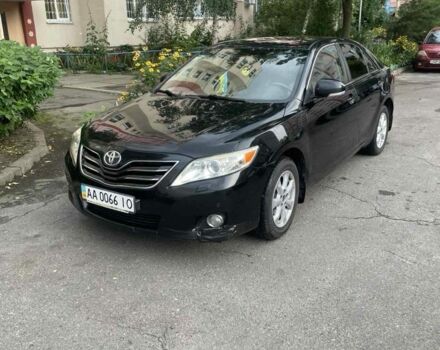 Черный Тойота Камри, объемом двигателя 2.4 л и пробегом 266 тыс. км за 7700 $, фото 1 на Automoto.ua