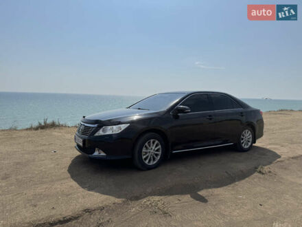 Черный Тойота Камри, объемом двигателя 2.49 л и пробегом 210 тыс. км за 13500 $, фото 1 на Automoto.ua