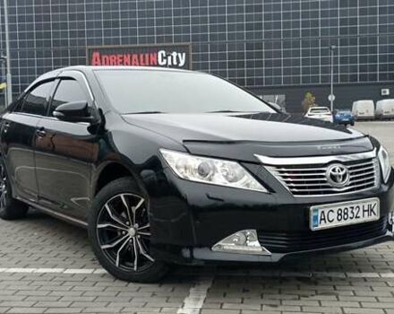 Черный Тойота Камри, объемом двигателя 2.5 л и пробегом 187 тыс. км за 11000 $, фото 1 на Automoto.ua