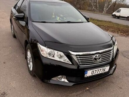 Черный Тойота Камри, объемом двигателя 2.49 л и пробегом 236 тыс. км за 11000 $, фото 1 на Automoto.ua
