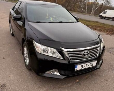 Чорний Тойота Камрі, об'ємом двигуна 2.49 л та пробігом 236 тис. км за 11000 $, фото 1 на Automoto.ua