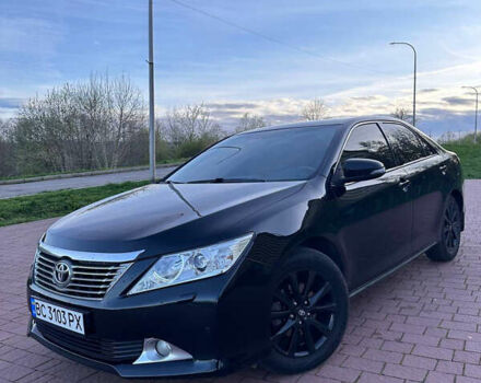 Чорний Тойота Камрі, об'ємом двигуна 2.49 л та пробігом 258 тис. км за 12500 $, фото 1 на Automoto.ua