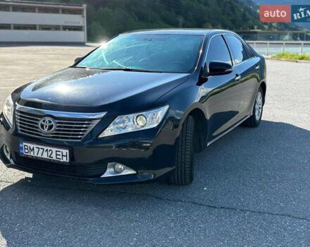 Чорний Тойота Камрі, об'ємом двигуна 2.49 л та пробігом 257 тис. км за 14000 $, фото 1 на Automoto.ua