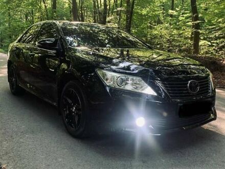 Черный Тойота Камри, объемом двигателя 2.5 л и пробегом 250 тыс. км за 13000 $, фото 1 на Automoto.ua