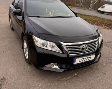 Черный Тойота Камри, объемом двигателя 2.5 л и пробегом 233 тыс. км за 11000 $, фото 1 на Automoto.ua
