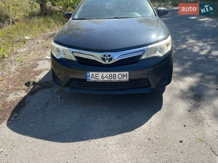 Черный Тойота Камри, объемом двигателя 2.5 л и пробегом 188 тыс. км за 10800 $, фото 1 на Automoto.ua