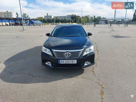 Черный Тойота Камри, объемом двигателя 2.5 л и пробегом 240 тыс. км за 13000 $, фото 1 на Automoto.ua