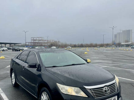 Черный Тойота Камри, объемом двигателя 2.49 л и пробегом 202 тыс. км за 12400 $, фото 1 на Automoto.ua