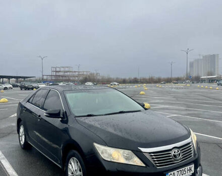 Черный Тойота Камри, объемом двигателя 2.49 л и пробегом 202 тыс. км за 12400 $, фото 1 на Automoto.ua