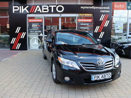 Чорний Тойота Камрі, об'ємом двигуна 2.4 л та пробігом 233 тис. км за 10900 $, фото 1 на Automoto.ua