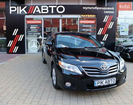 Черный Тойота Камри, объемом двигателя 2.4 л и пробегом 233 тыс. км за 10900 $, фото 1 на Automoto.ua