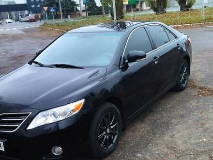 Черный Тойота Камри, объемом двигателя 2.36 л и пробегом 248 тыс. км за 10500 $, фото 1 на Automoto.ua