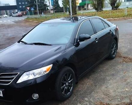 Черный Тойота Камри, объемом двигателя 2.36 л и пробегом 248 тыс. км за 10500 $, фото 1 на Automoto.ua