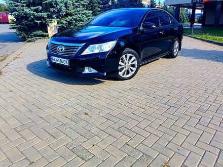 Черный Тойота Камри, объемом двигателя 2.5 л и пробегом 180 тыс. км за 13100 $, фото 1 на Automoto.ua