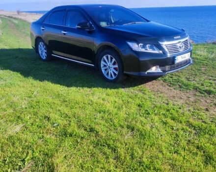 Черный Тойота Камри, объемом двигателя 2.5 л и пробегом 300 тыс. км за 12300 $, фото 1 на Automoto.ua