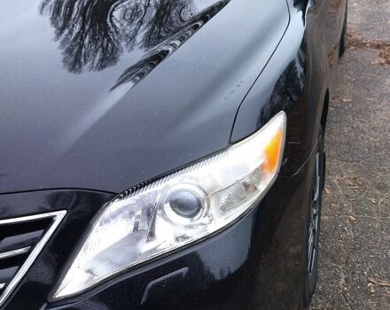 Черный Тойота Камри, объемом двигателя 2.4 л и пробегом 248 тыс. км за 10500 $, фото 1 на Automoto.ua