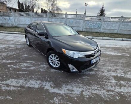 Черный Тойота Камри, объемом двигателя 2.49 л и пробегом 220 тыс. км за 9500 $, фото 1 на Automoto.ua