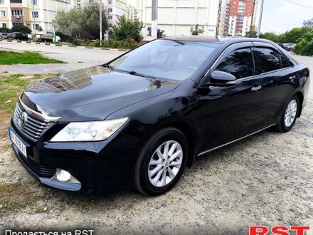 Черный Тойота Камри, объемом двигателя 2.5 л и пробегом 20500 тыс. км за 14300 $, фото 1 на Automoto.ua