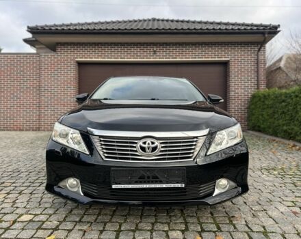 Черный Тойота Камри, объемом двигателя 2.5 л и пробегом 143 тыс. км за 13300 $, фото 1 на Automoto.ua