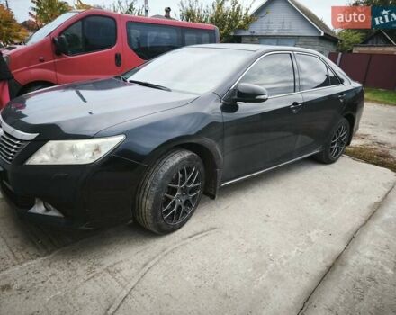 Чорний Тойота Камрі, об'ємом двигуна 2.5 л та пробігом 124 тис. км за 13500 $, фото 1 на Automoto.ua