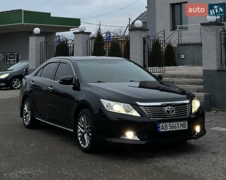 Черный Тойота Камри, объемом двигателя 2.5 л и пробегом 283 тыс. км за 11800 $, фото 1 на Automoto.ua